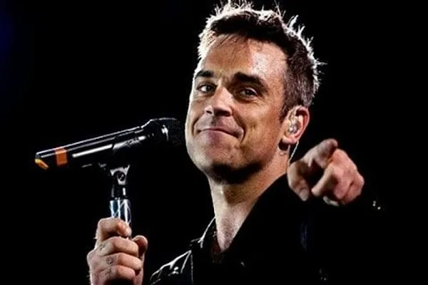 Robbie Williams depresso, dichiarazione shock: “Vuole uccidermi”
